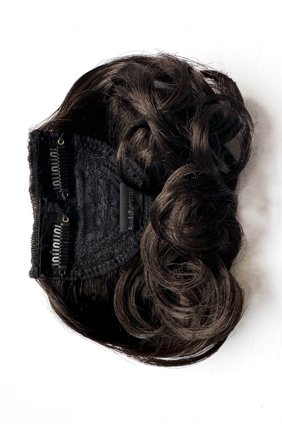 Black hair extension on a white background. Curly 1940s style clip-in fringe hairpiece/clip-in bangs: Bunny brown 4