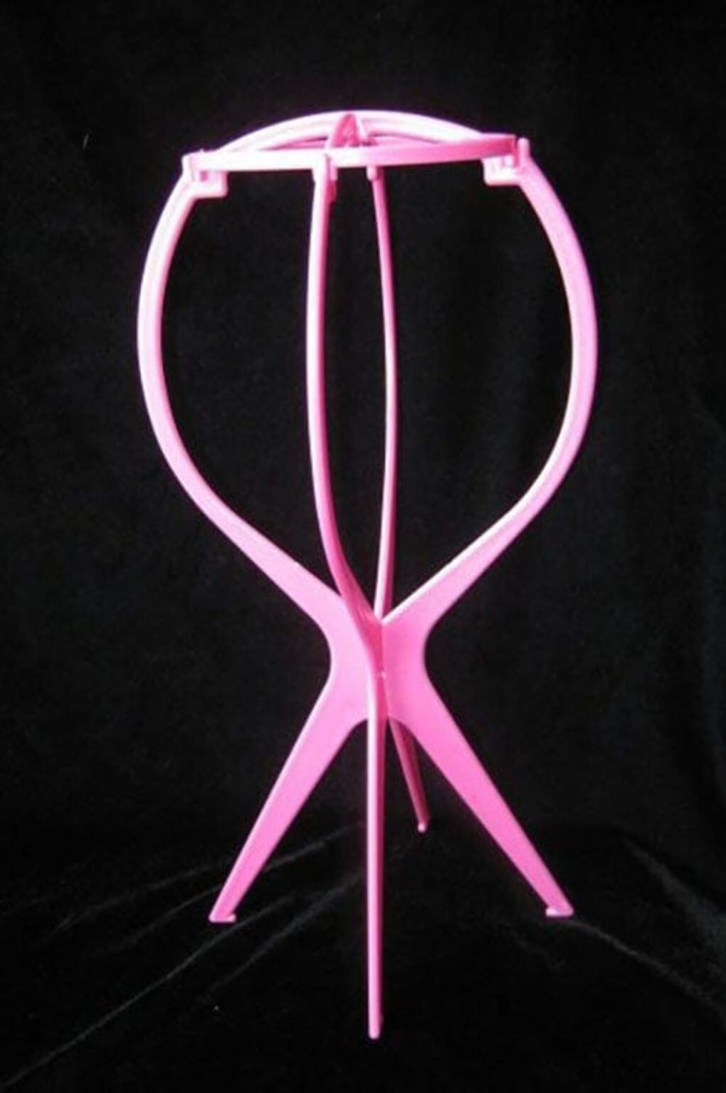 A collapsible wig stand - pink
