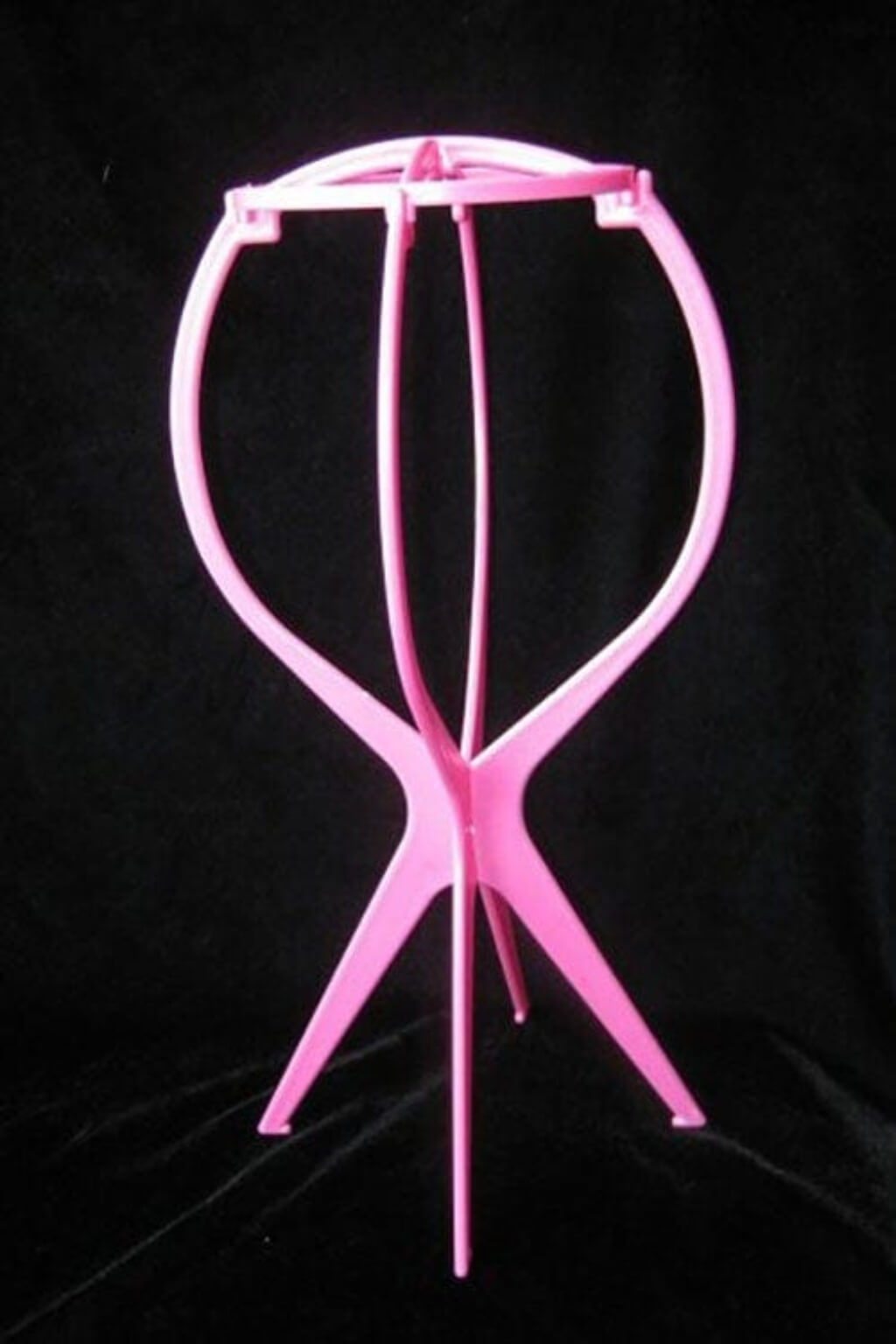 A collapsible wig stand - pink
