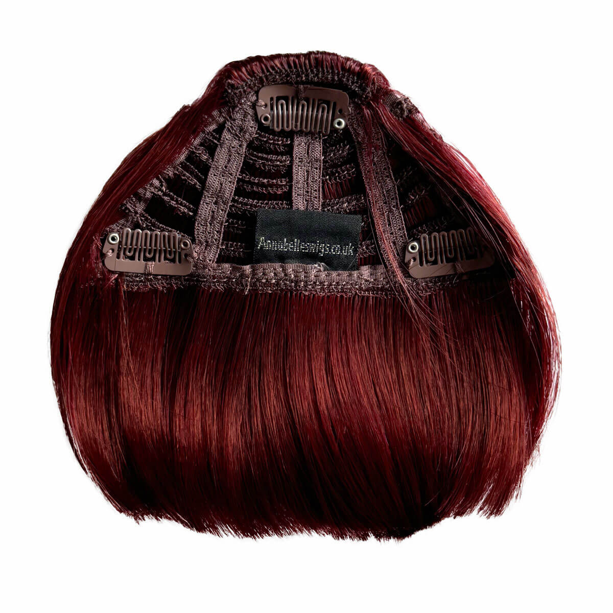 Red hair extension with a clip on a white background. Clip-in fringe hairpiece/clip-in micro-bangs, thick, straight retro rockabilly style: Ida copper cherry red 35039
