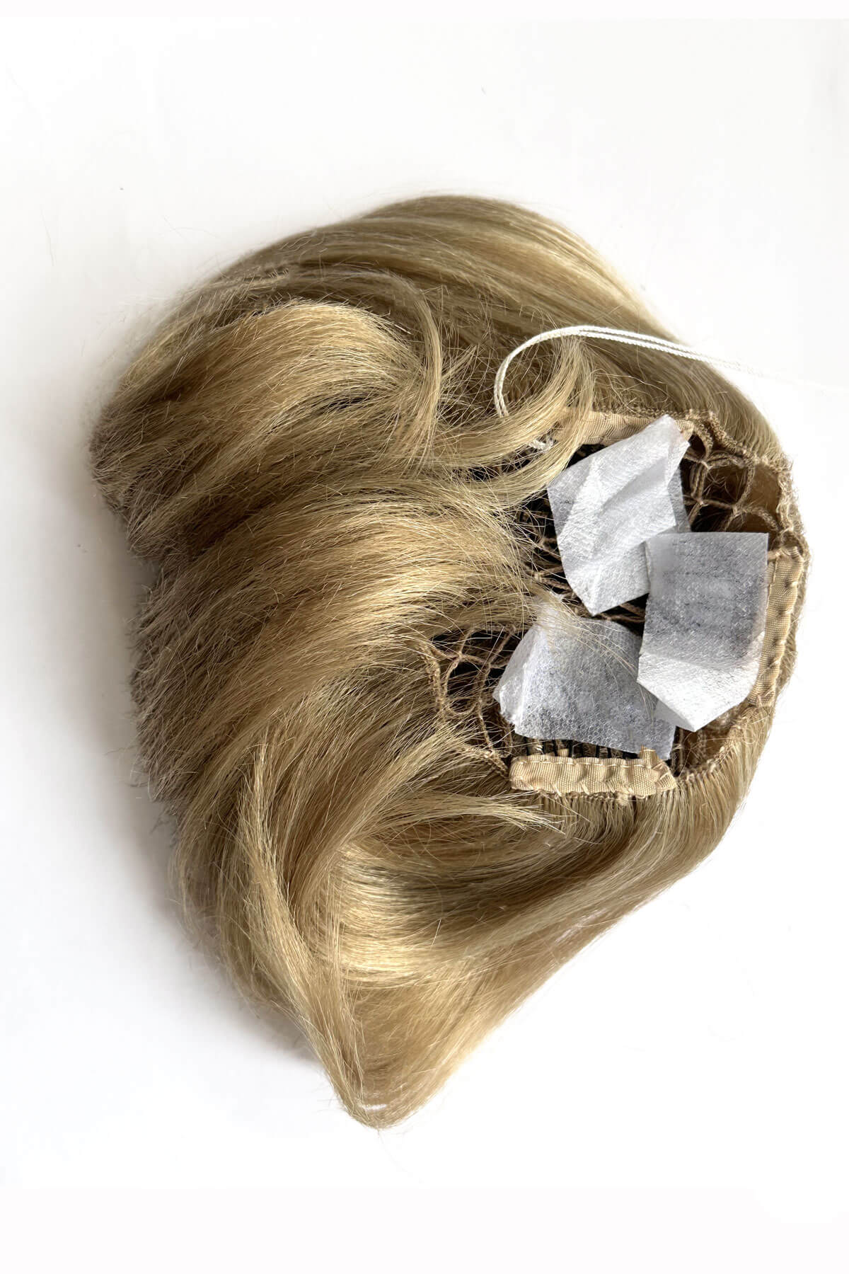 Blonde hair extension on a white background. Beehive hairpiece hair height booster, Flexihair: Pixi blonde 24H613