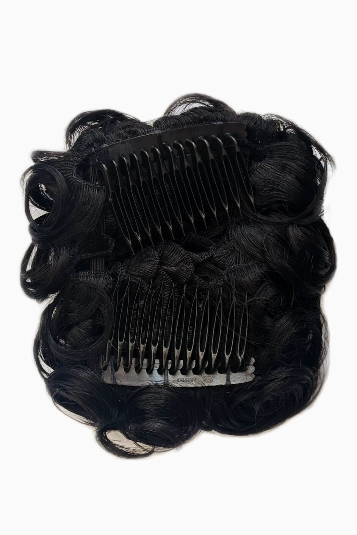 Black hair extension with a comb on a white background. Jet black 1
