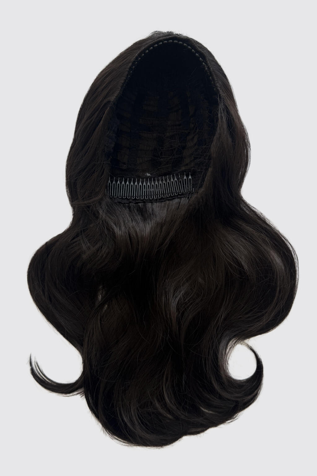 Dark brown hair extension on a mannequin head against a white background. 1960s style hair, high crown long straight and layered half wig: Juliette dark brown 4