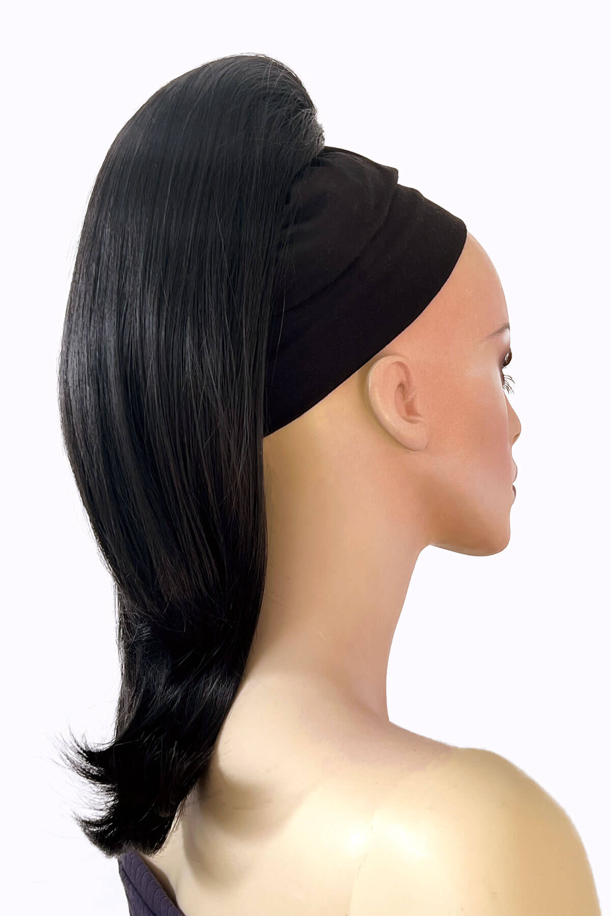 Mannequin head with black hair styled in a ponytail, wearing a black headband on a white background. Long ponytail hairpiece, straight with flick: Clarisa black 1B
