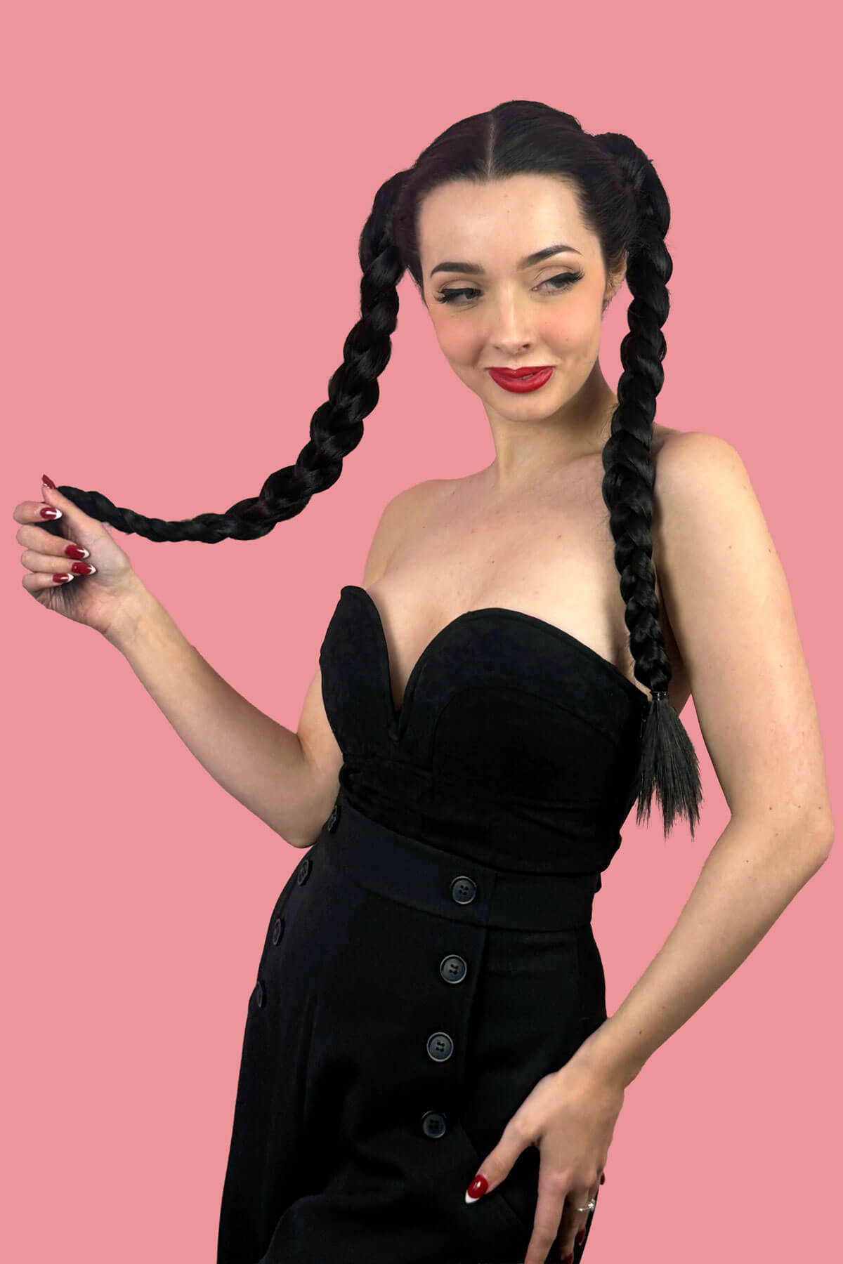 Woman with long braided hair wearing a black dress. Long double plaited ponytail hairpiece: Martha chocolate brown 6