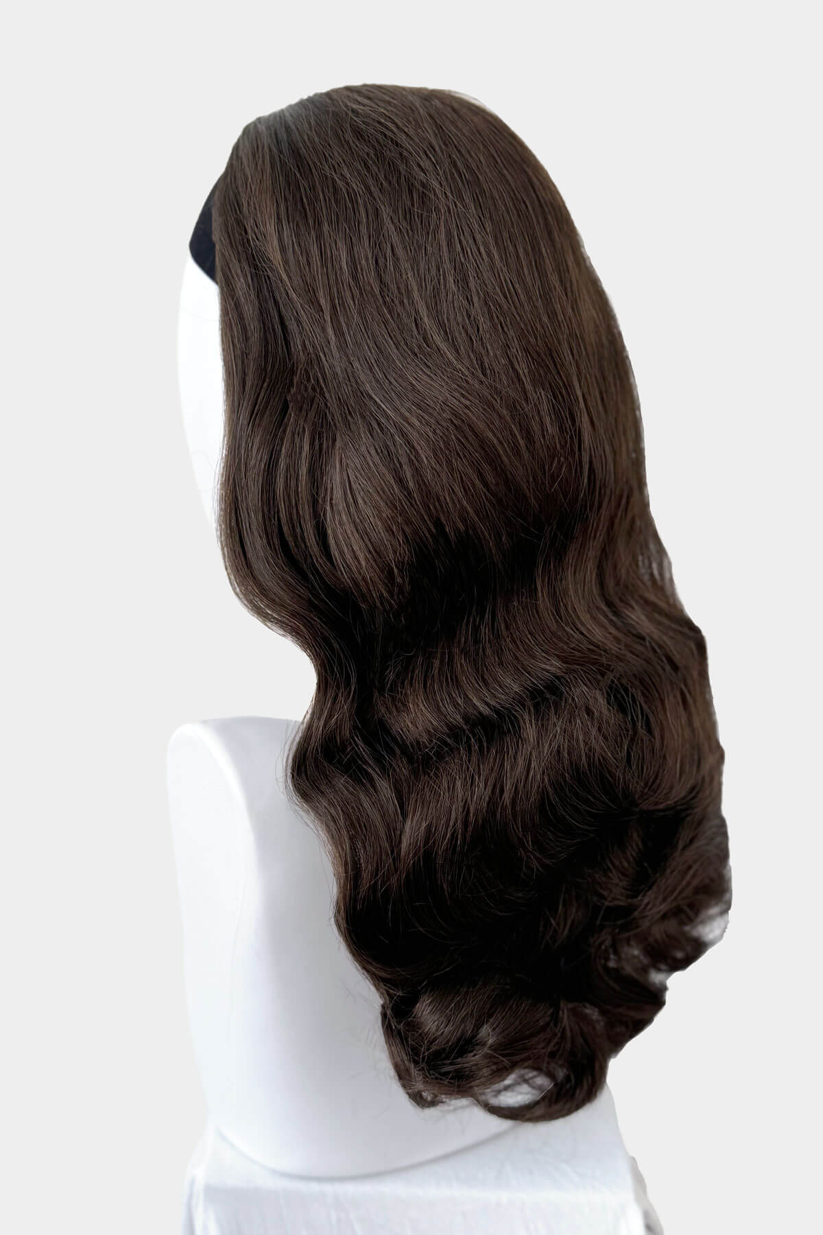 Chestnut brown wig on a mannequin head against a white background. 1950s style half wig hairpiece with beautiful waves: Morgana chestnut brown 8