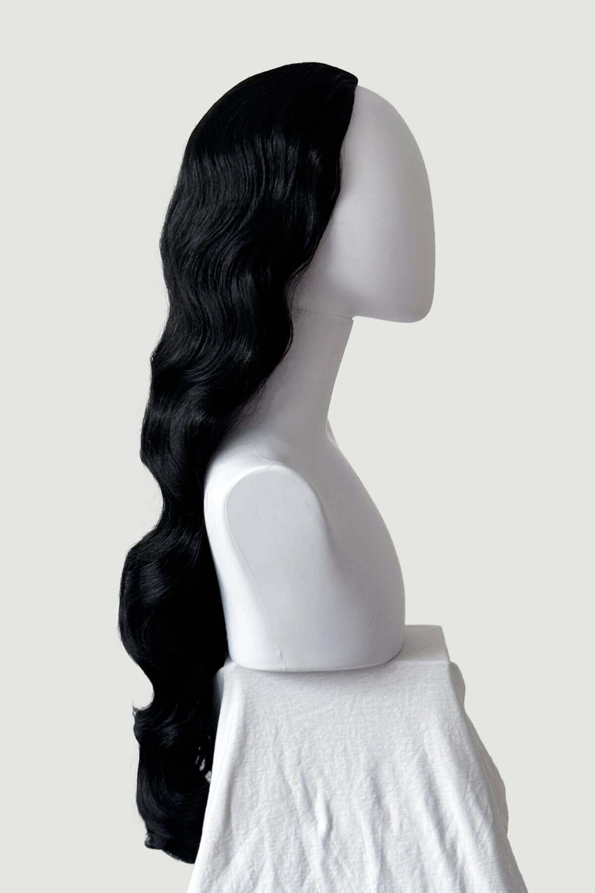 Mannequin with long wavy black half wig. Ultra long half wig with hollywood waves. black 1B