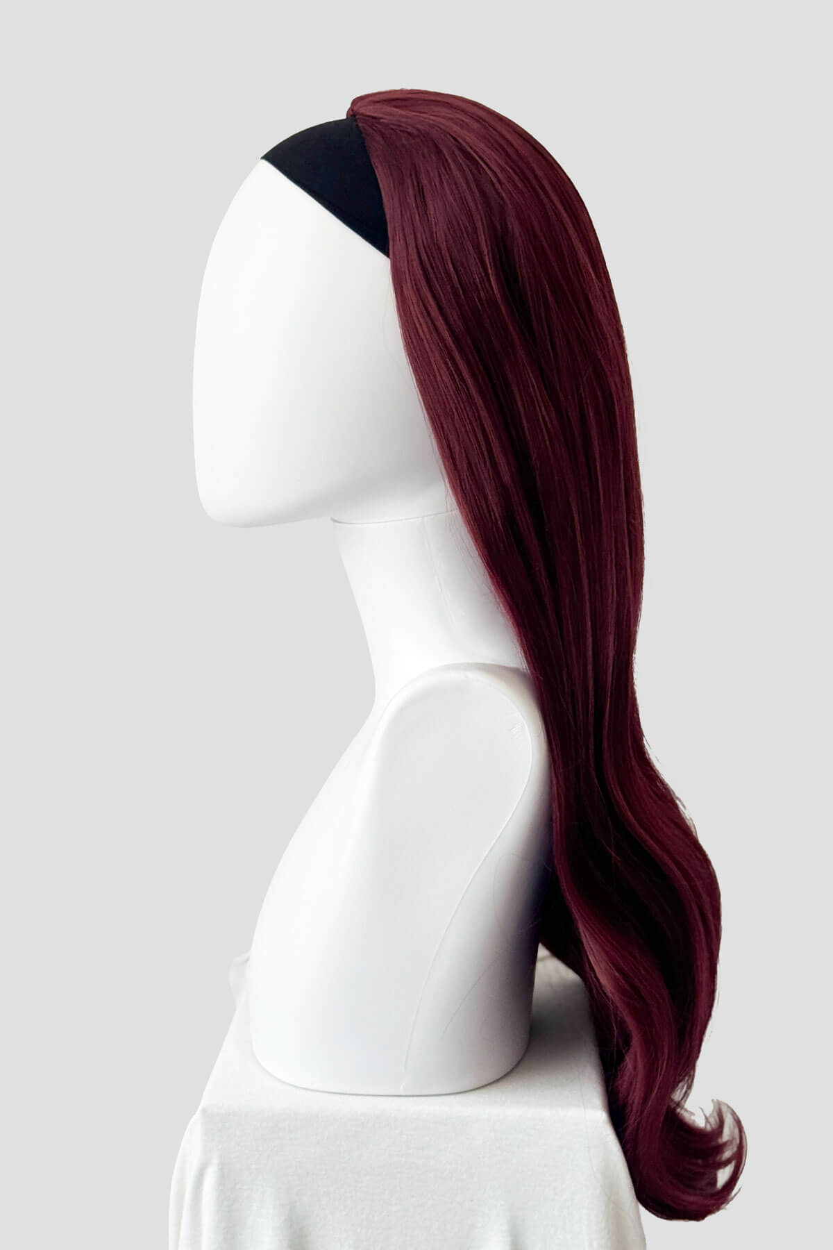 Mannequin head with red wig on a white background. Kate - Heat Styleable Extra Long, Gentle Wave Half Wig red 39