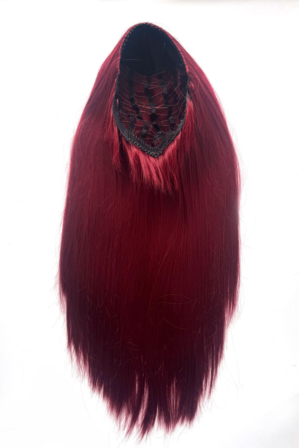 Red hair extension on a white background. 1960s style hair, high crown long straight half wig: Andrea cherry red 39