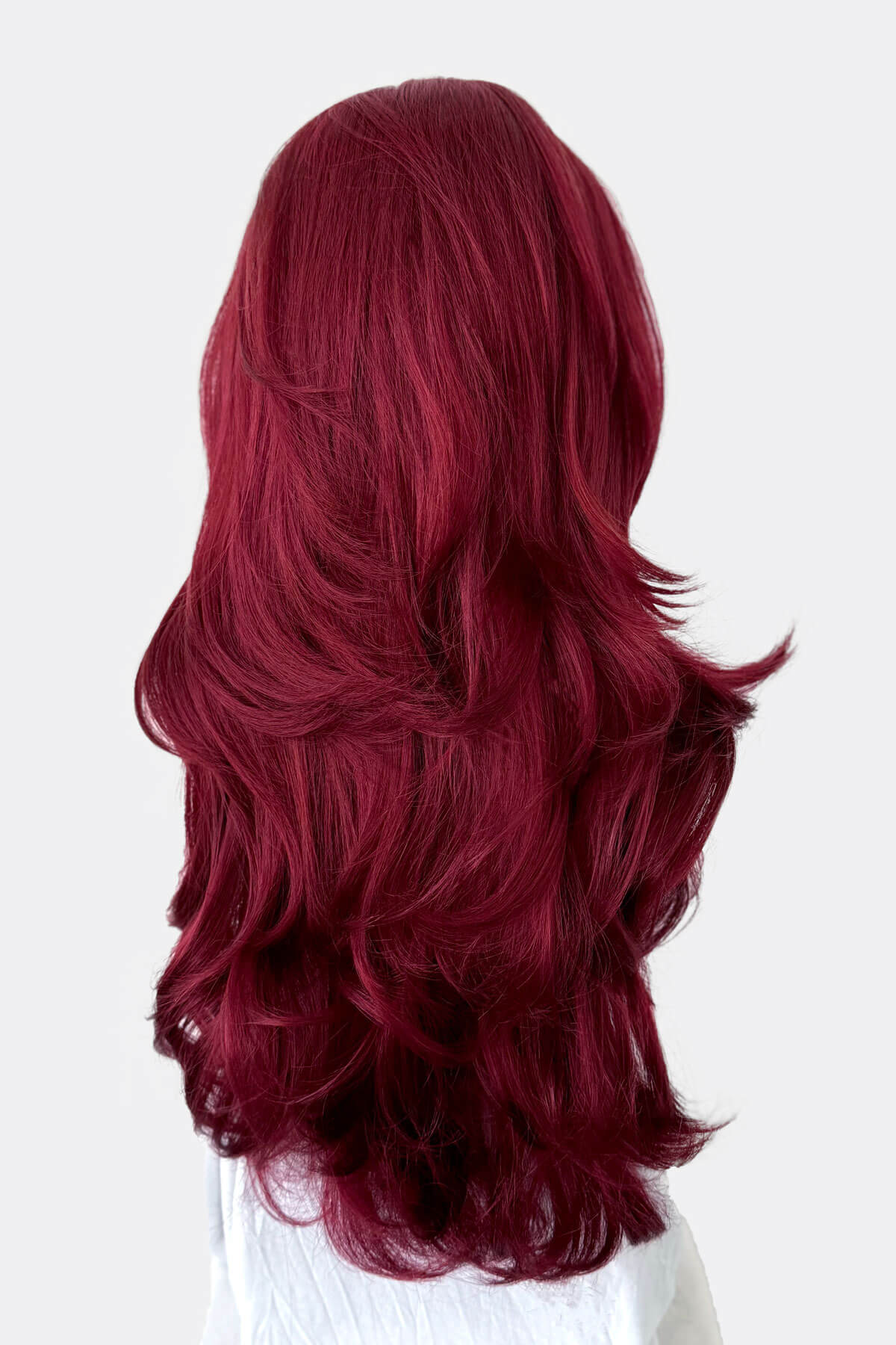Red wig on a white background. Red half wig hairpiece (3/4 wig), gentle curls: Ivy wine red 39