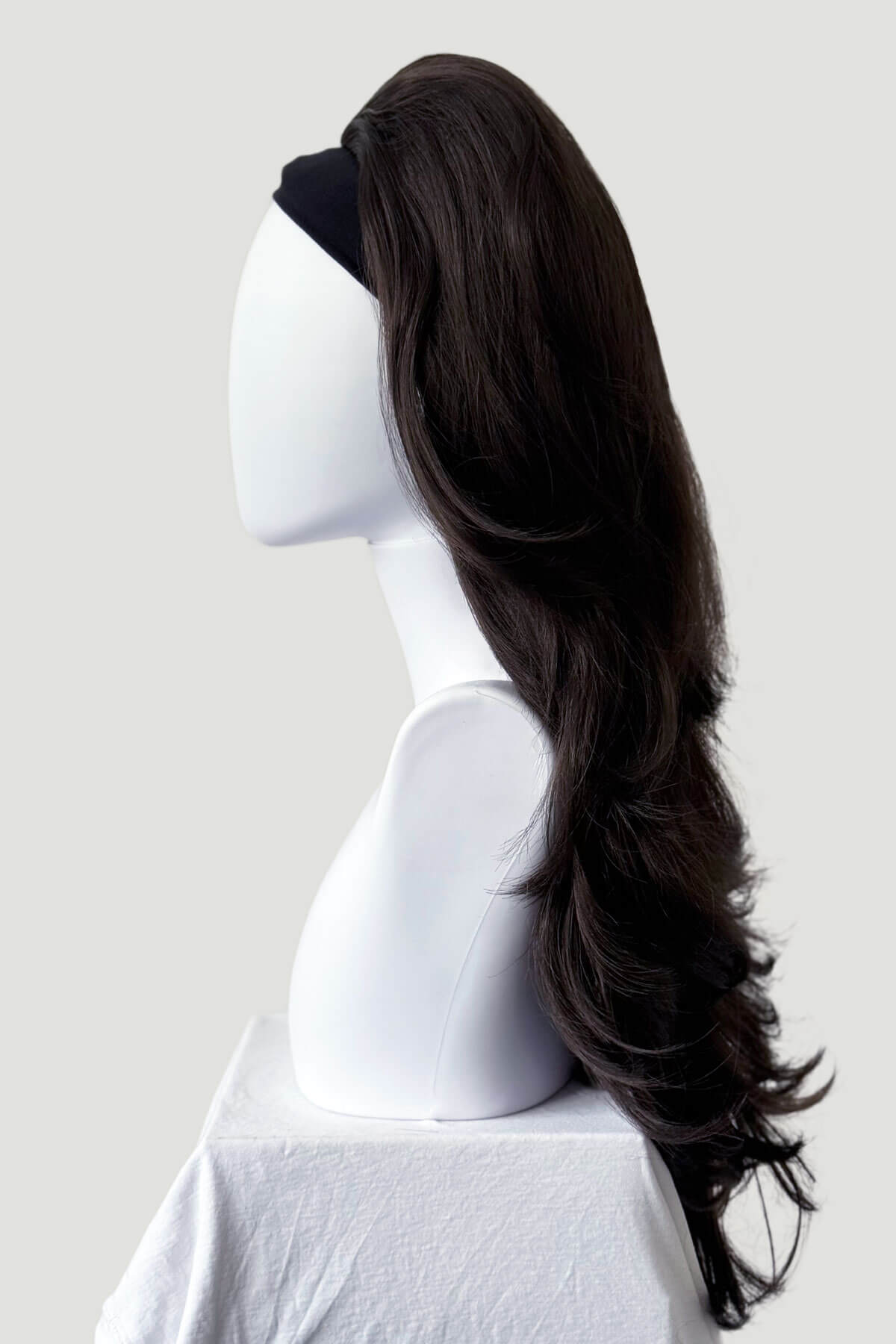 Dark brown wig on a mannequin head against a white background. High crown long, layered half wig and volume ring: Helena dark chocolate brown 6
