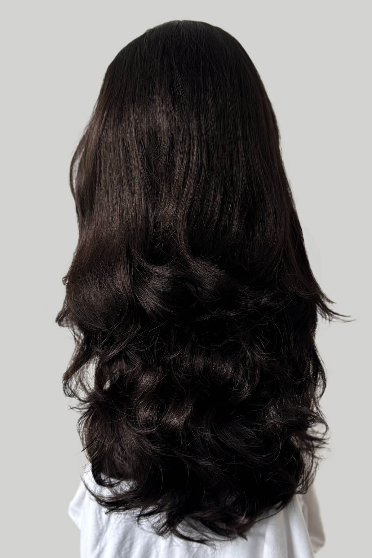 Long, dark hair on a plain background. Brown half wig hairpiece, full, long with gentle waves: Taya dark brown 4