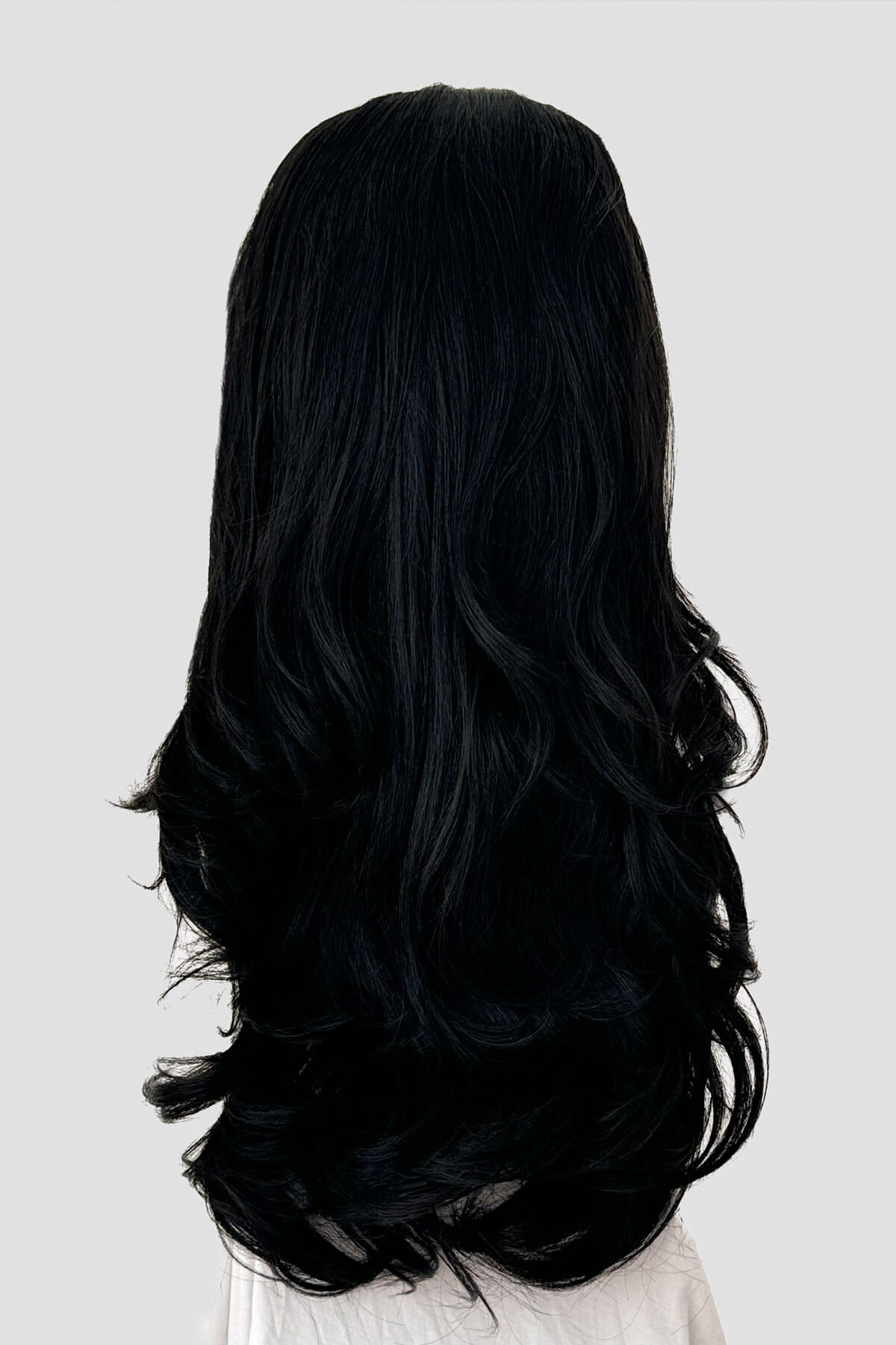 Black wig on a white background. High crown long, wavy half wig and volume ring: Bardot black 1B