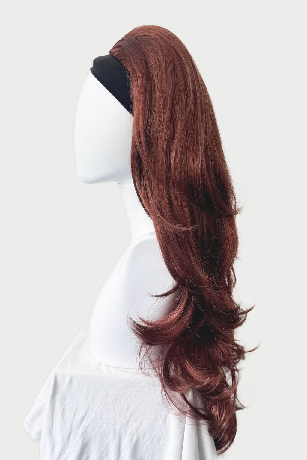Brown wig on a mannequin head against a white background - High crown long layered half wig and volume ring Helena copper red 130