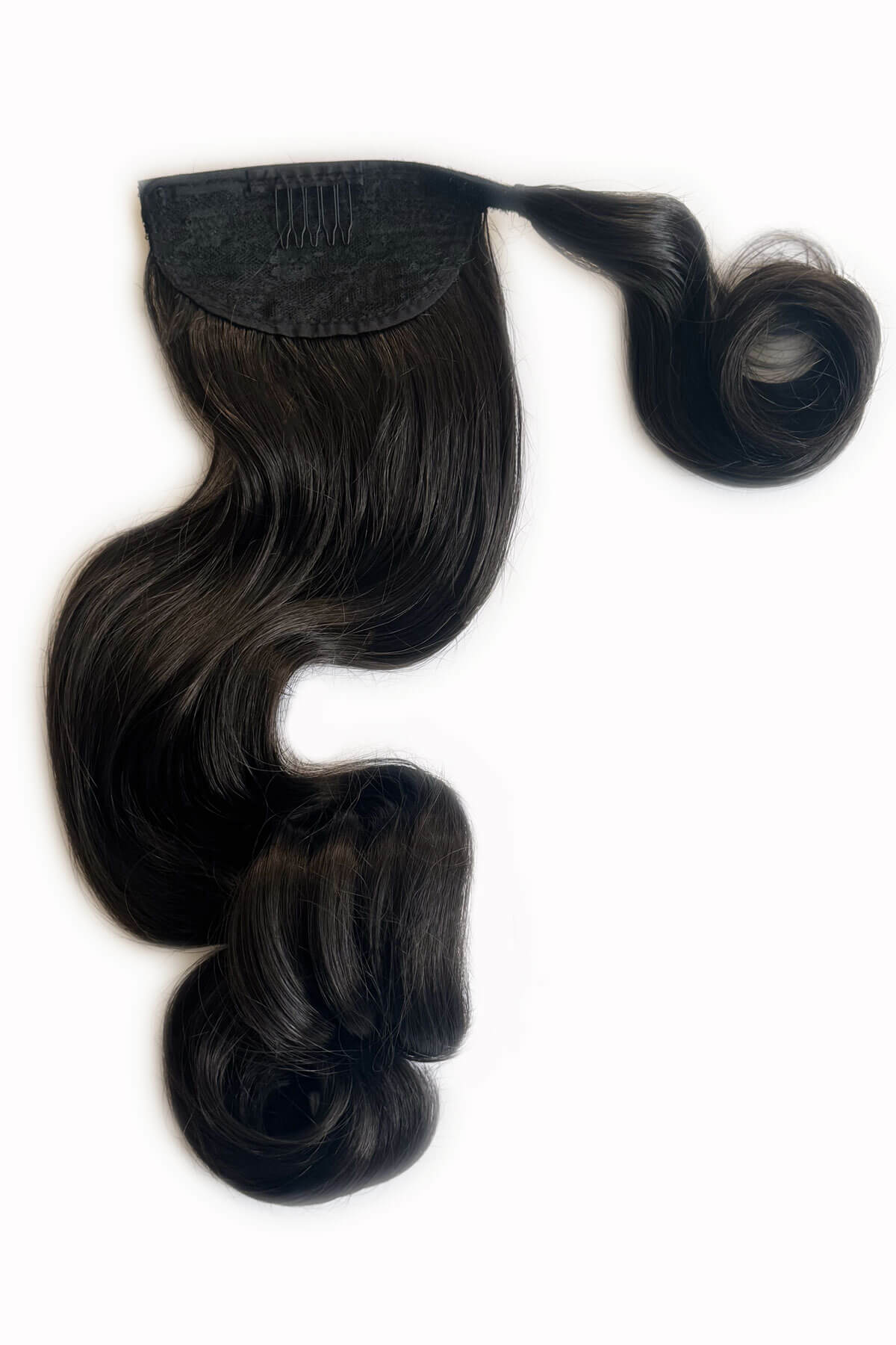 Dark brown hair extensions on a white background. Long ponytail with vintage waves: Kitrysha dark brown 4