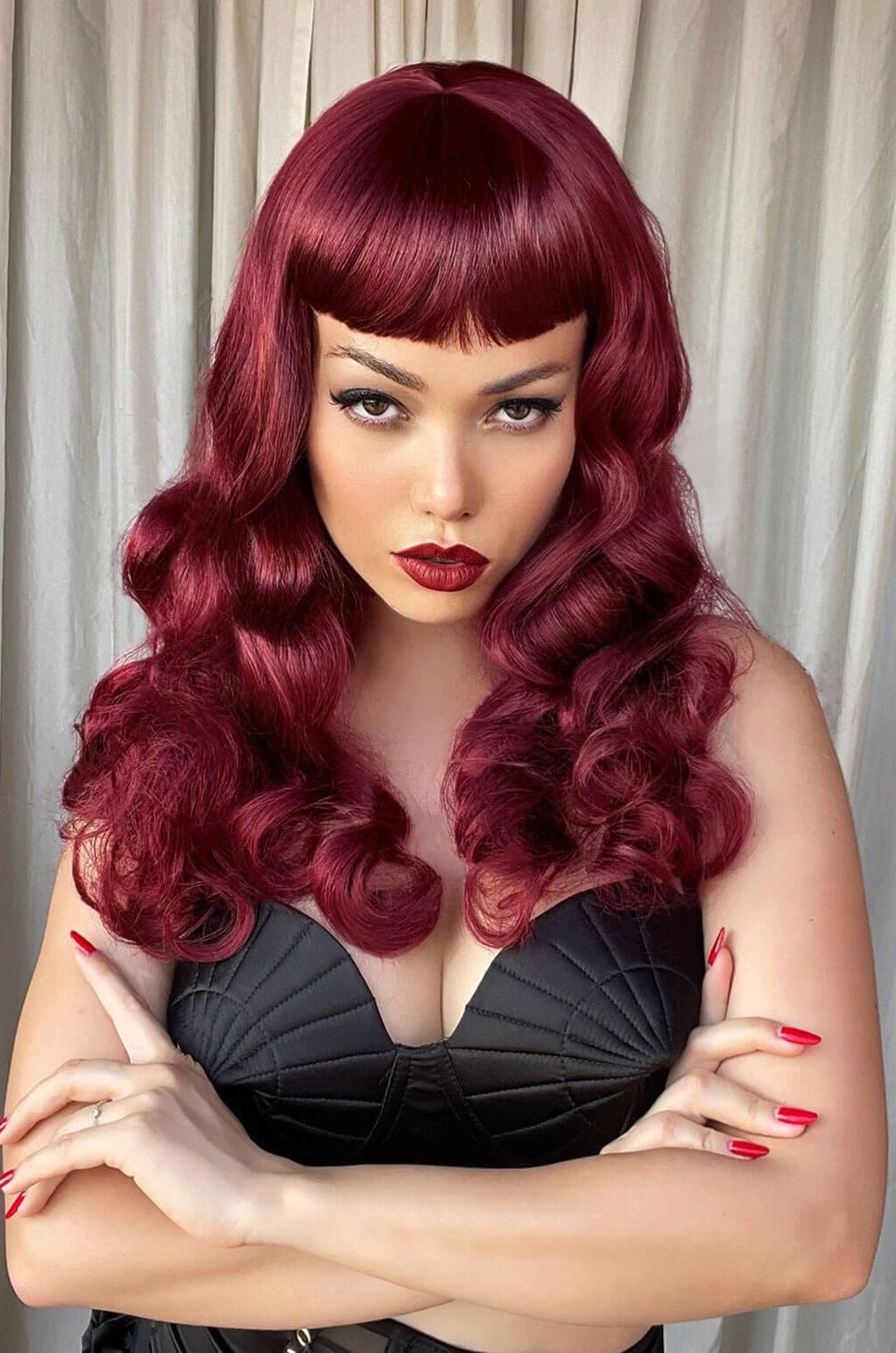 Long cherry red pin-up wig, gently wavy with short fringe: Maeve