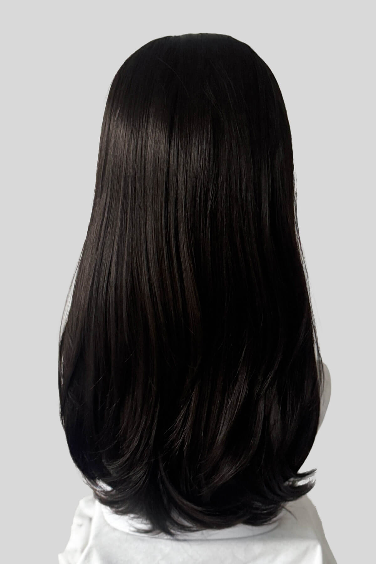 A close-up of a dark brown headband half wig hairpiece showing the texture of the hair against a white background. Headband half wig hairpiece, long and straight: Isla dark brown 4