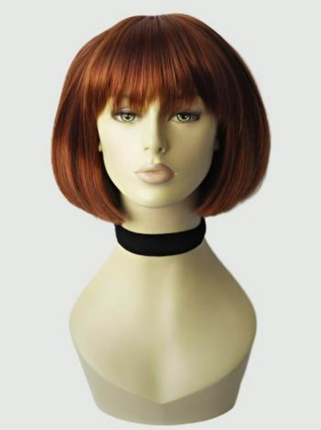 Red bob wig on a mannequin head with a plain background. Copper red wig, bob style: Siren