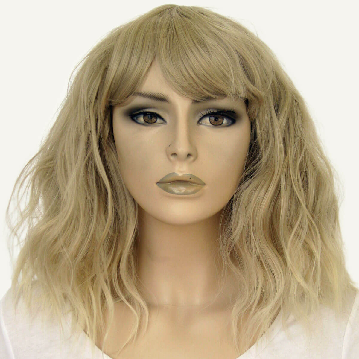 Blonde wig on a mannequin head with a white background. Long blonde bob wig (LOB) with textured waves: Kara