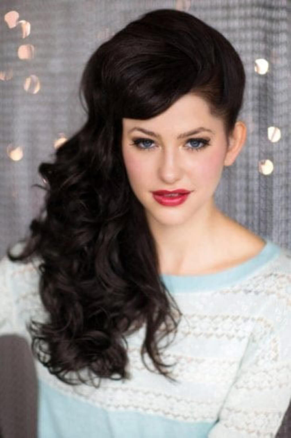 Woman with styled hair and makeup against a neutral background. Clip in fringe hairpiece, side sweeping/clip-in bangs: Mila brown 6