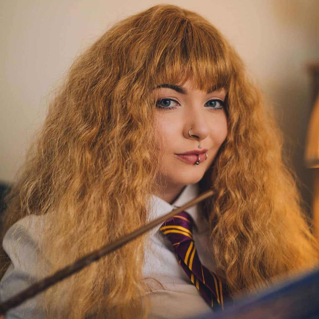 Hermione from Harry Potter wearing a long brown crimped wig, brown and blonde dip dye (ombre): Tiggy