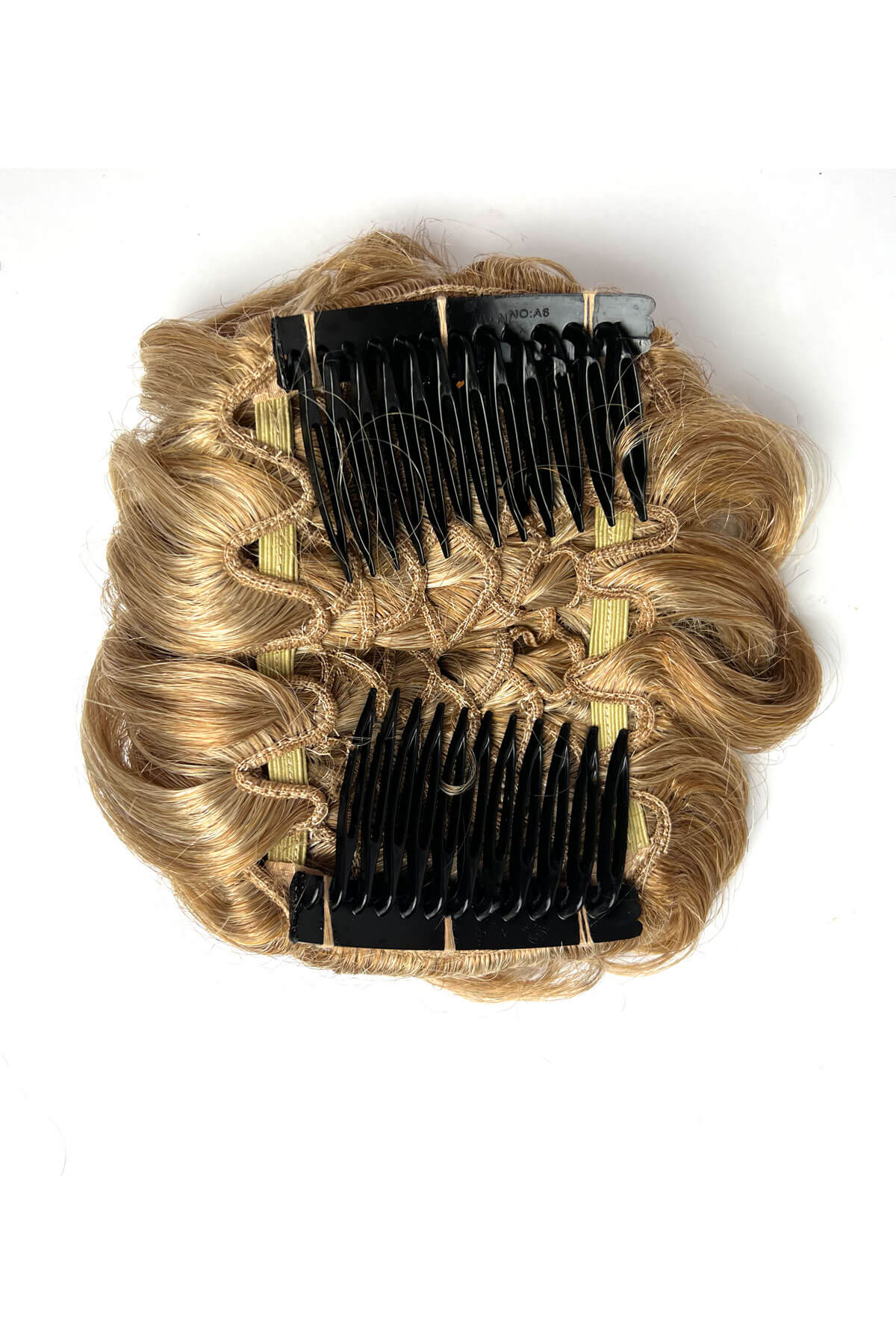 Blonde hair extension with black combs on a white background. Hair poodle clip-in hairpiece bun vintage style 1950s: Lucille blonde 24BH613