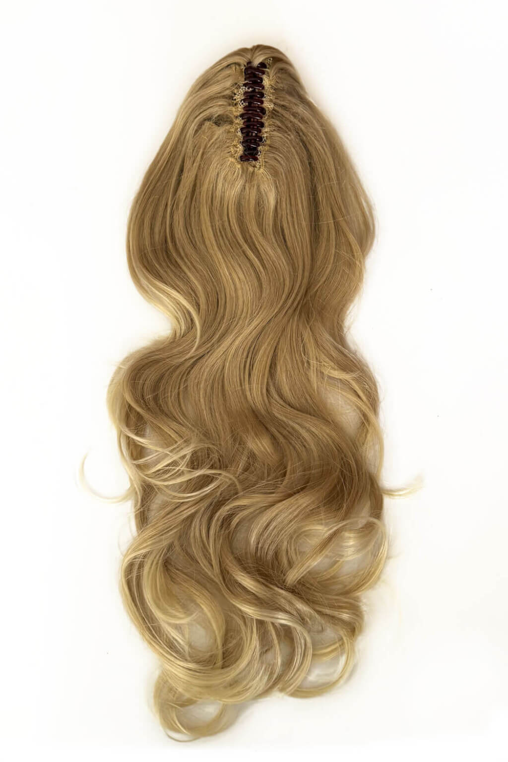 Blonde hair extension with wavy texture on a white background. Clip-in ponytail hairpiece extension: Olivia blonde 613T24
