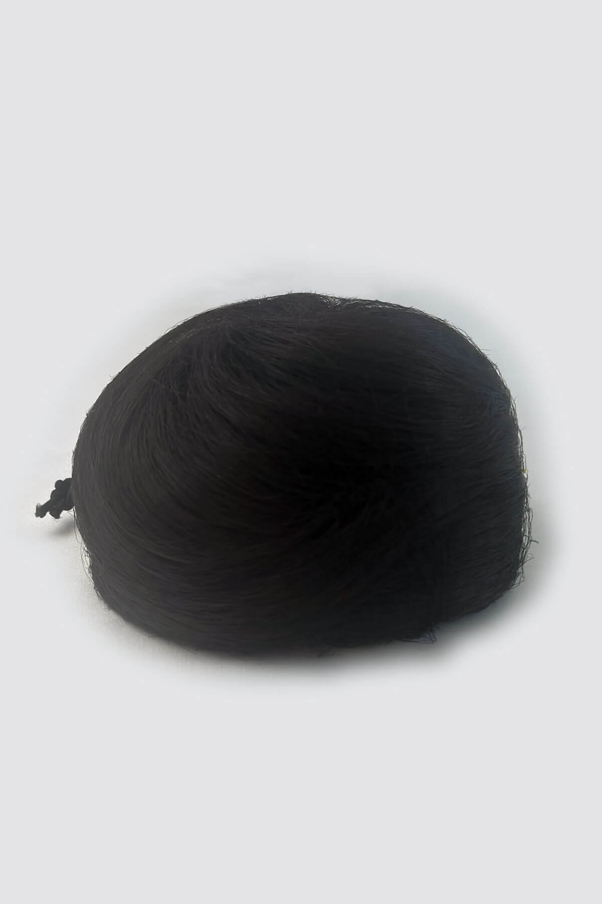 Dark brown hairpiece on a white background. Hairpiece bun; instant perfect bun hairpiece: Hepburn dark brown 4