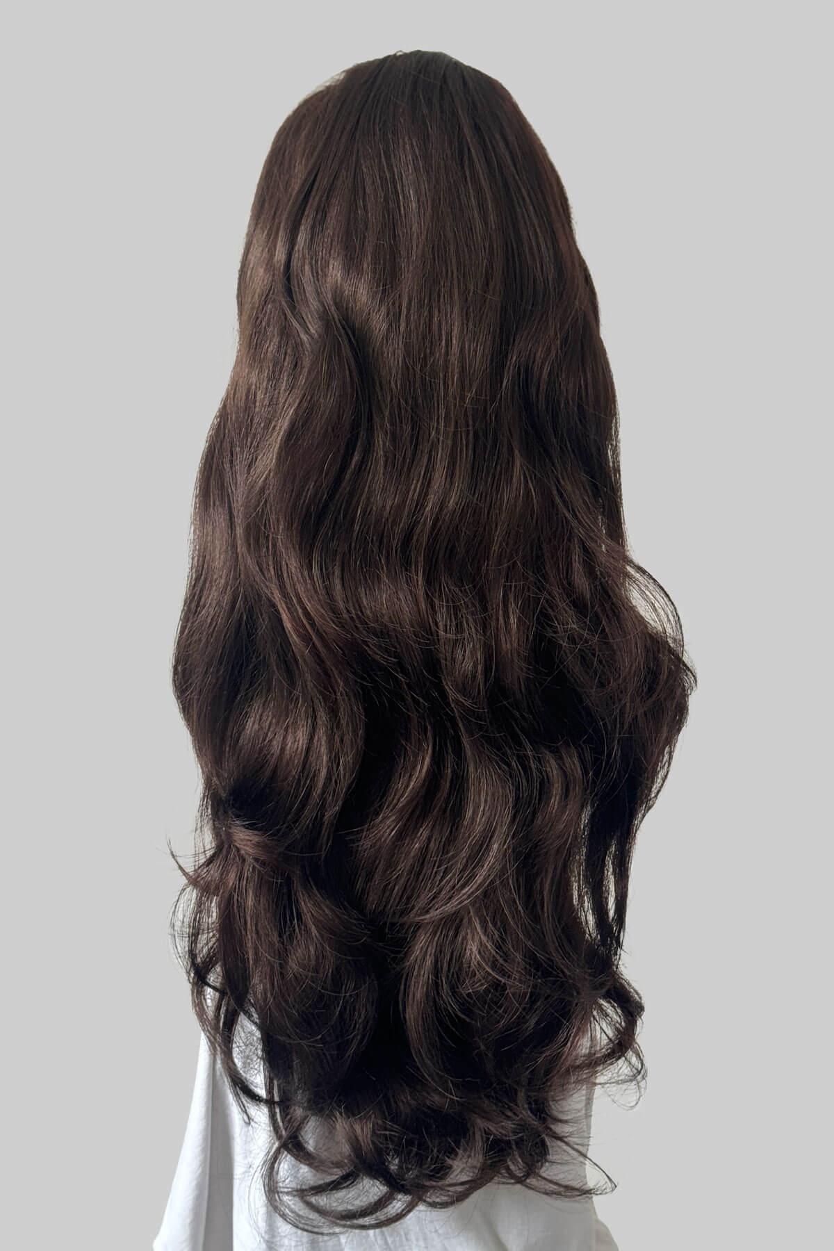 Long, dark reddish brown wavy wig displayed on a white mannequin head and shoulders against a grey background. Corrine - Bouncy Blowout style with Volume Booster Half Wig dark reddish brown 6/33