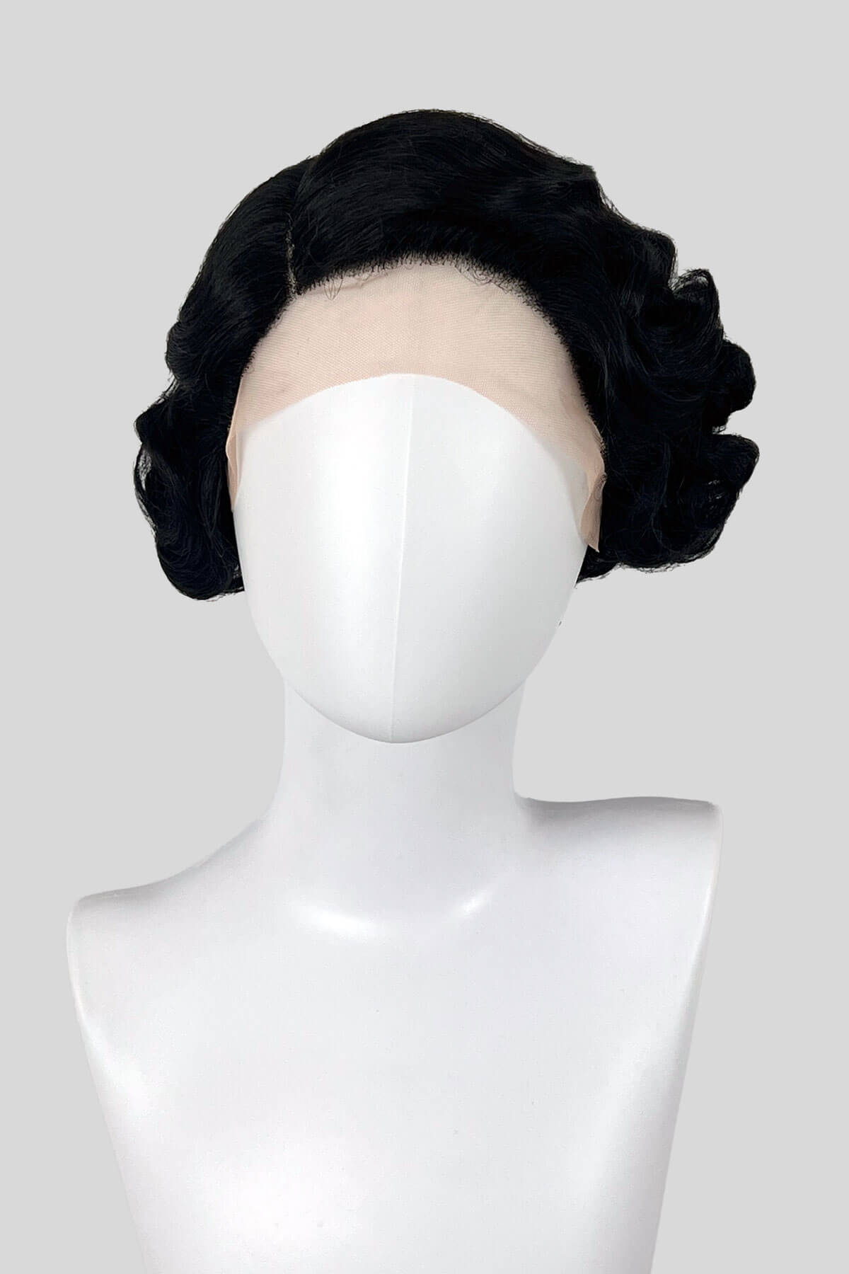 Black hairpiece styled on a mannequin head against a white background. Black lacefront wig, pinup/vintage style, short with finger waves: Viola