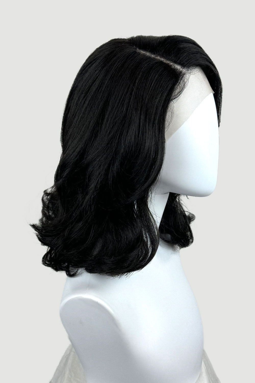 Black shoulder length long bob (lob) lacefront wig with side sweeping fringe/bangs: Amaris from the side on a mannequin