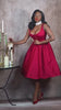 Woman with red dress and beautiful black hair. Black pinup wig, lace front with long finger waves: Tyra