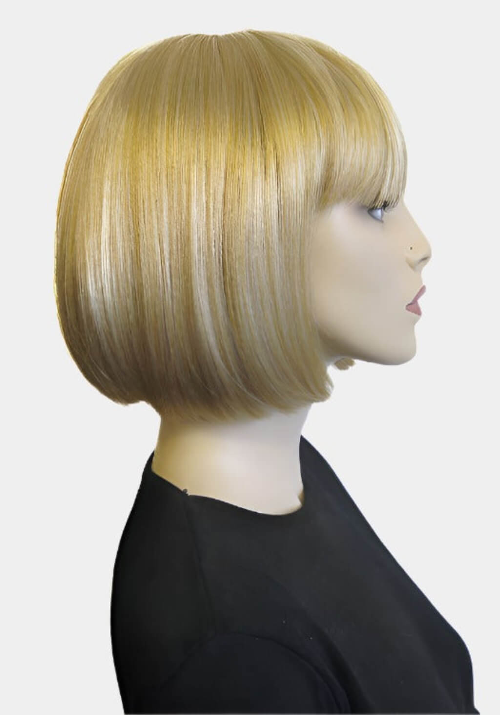 Mannequin head with a blonde bob wig on a white background. Blonde bob wig with fringe: Gracie blonde 24B
