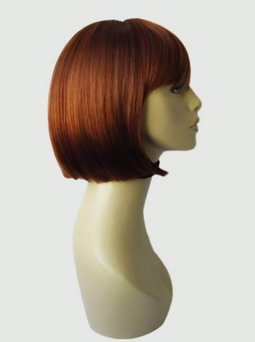 Brown bob wig on a mannequin head against a white background. Copper red wig, bob style: Siren