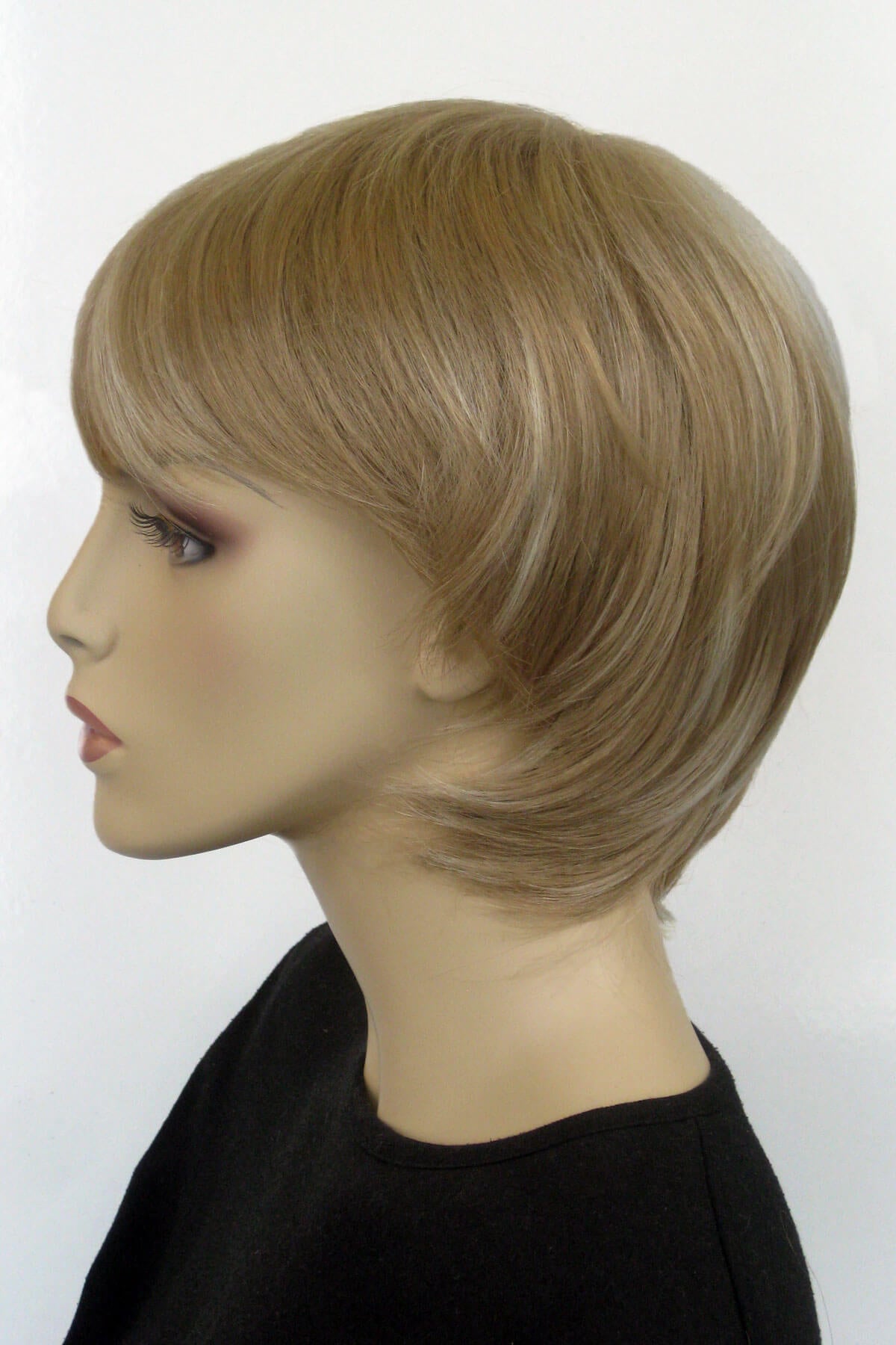 Mannequin head with a blonde wig on a white background. Pixie cut wig, layered and short: Sophia